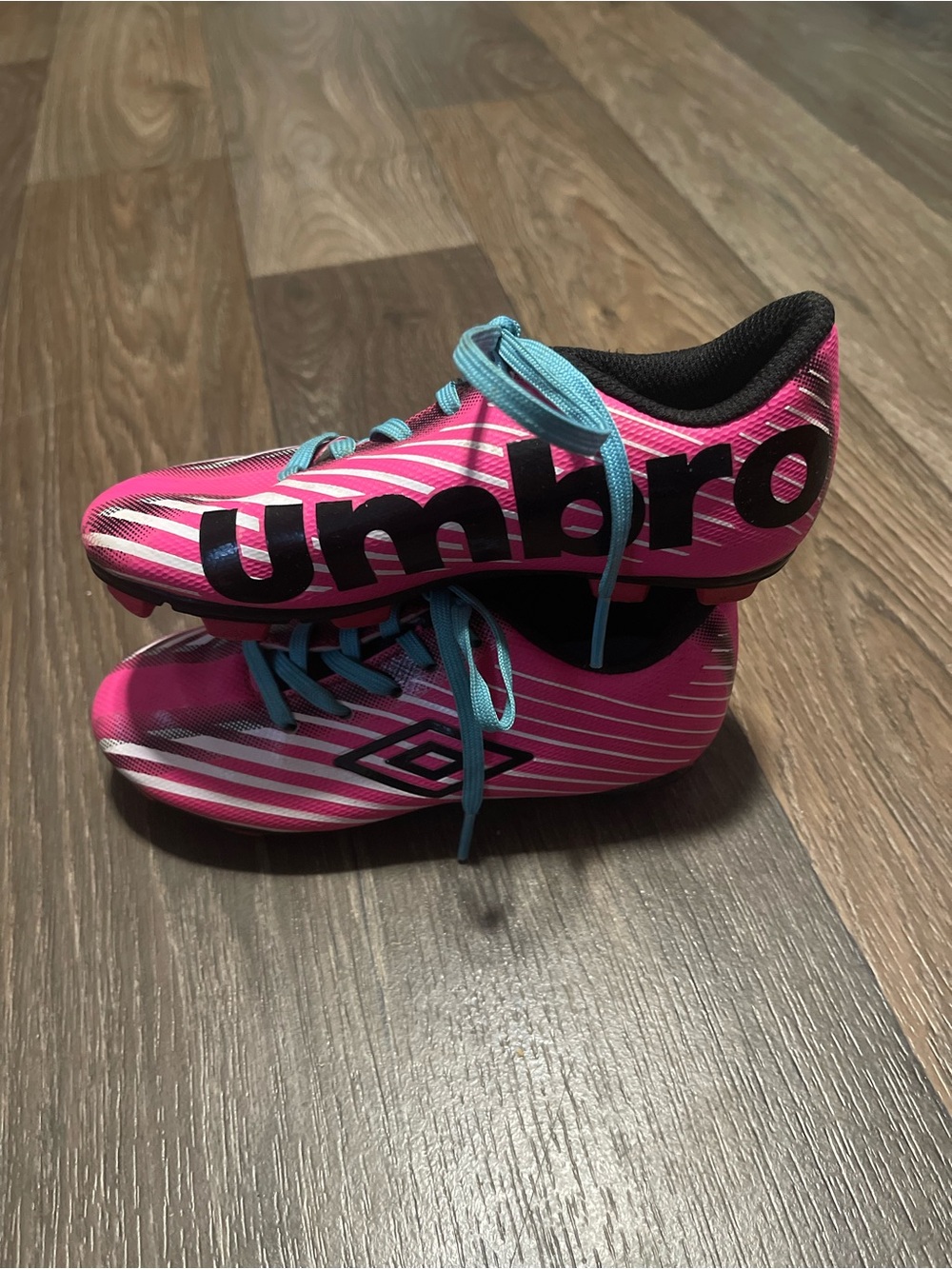 Umbro Kids Pink Soccer Cleats with Blue Laces